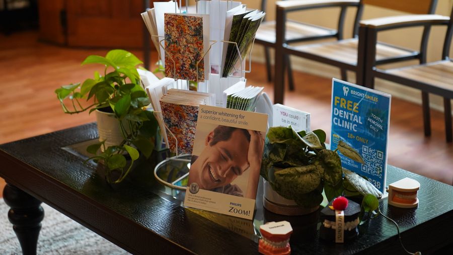Franklin Dental reception table with brochures and plants